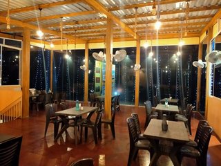 For Sale: Restaurant on national highway with a 5,000 sq. ft. building and 3,000 sq. ft. land.