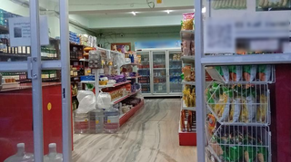 Supermarket in central Thimphu with 40+ customers/day and 10+ suppliers seeks loan to expand.