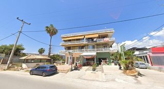 Beachfront 3-story building near Athens with potential for a 3-4 star hotel with 11% ROI.