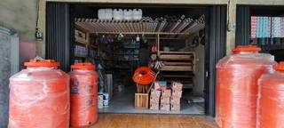 Construction material retail shop in Jambi, Indonesia, with 500-600 daily customers seeks loan for expansion.