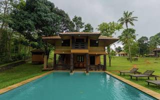 Boutique farmhouse/ resort on 3.5 acres in Kottayam Kerala is for sale.