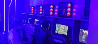 Newly established gaming center with high-end PCs and PS5, near a well-known university in Chennai.