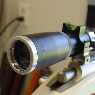 Design and assembly of multi composite poly-carbonate optics in firearm scopes.