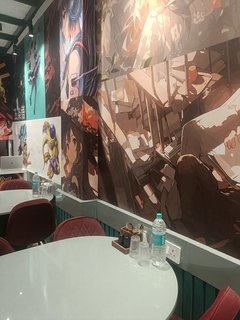 Anime themed cafe in New Delhi with 40-seat capacity and 100+ daily orders.
